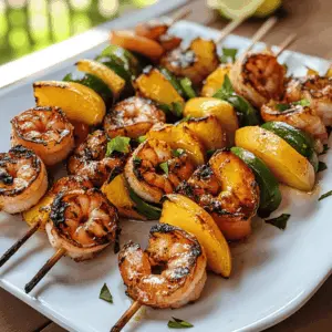 Get ready for a summer treat with these Grilled Shrimp and Peach Kabobs! Juicy shrimp paired with sweet, caramelized peaches create a delicious dish perfect for BBQs or family gatherings. Serve these easy-to-make kabobs at your next picnic, and watch them disappear. Don’t forget to save this recipe for your warm-weather cookouts!